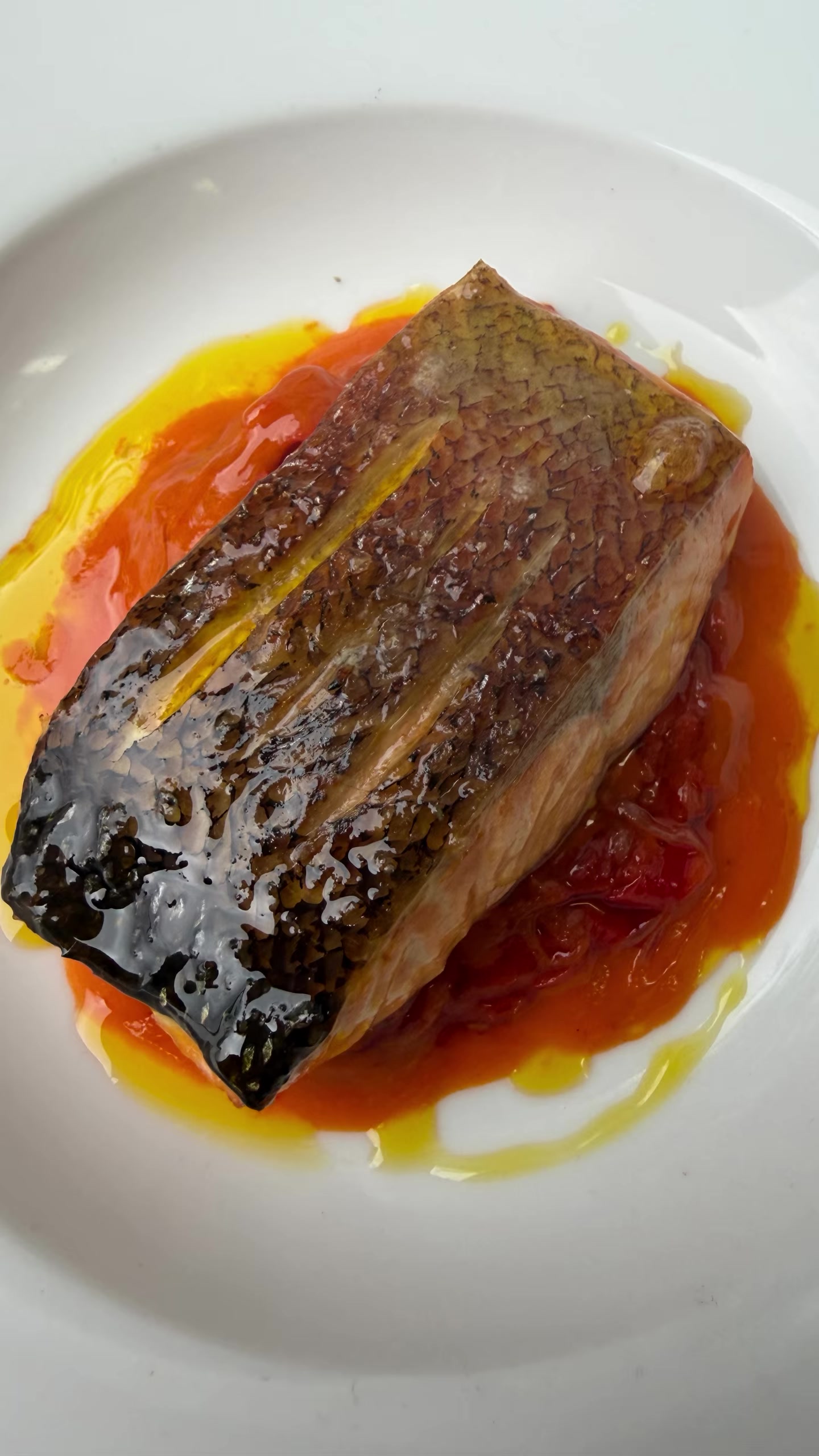A seared fish course plated by Bohemien at a previous Red Hill Supper Club
