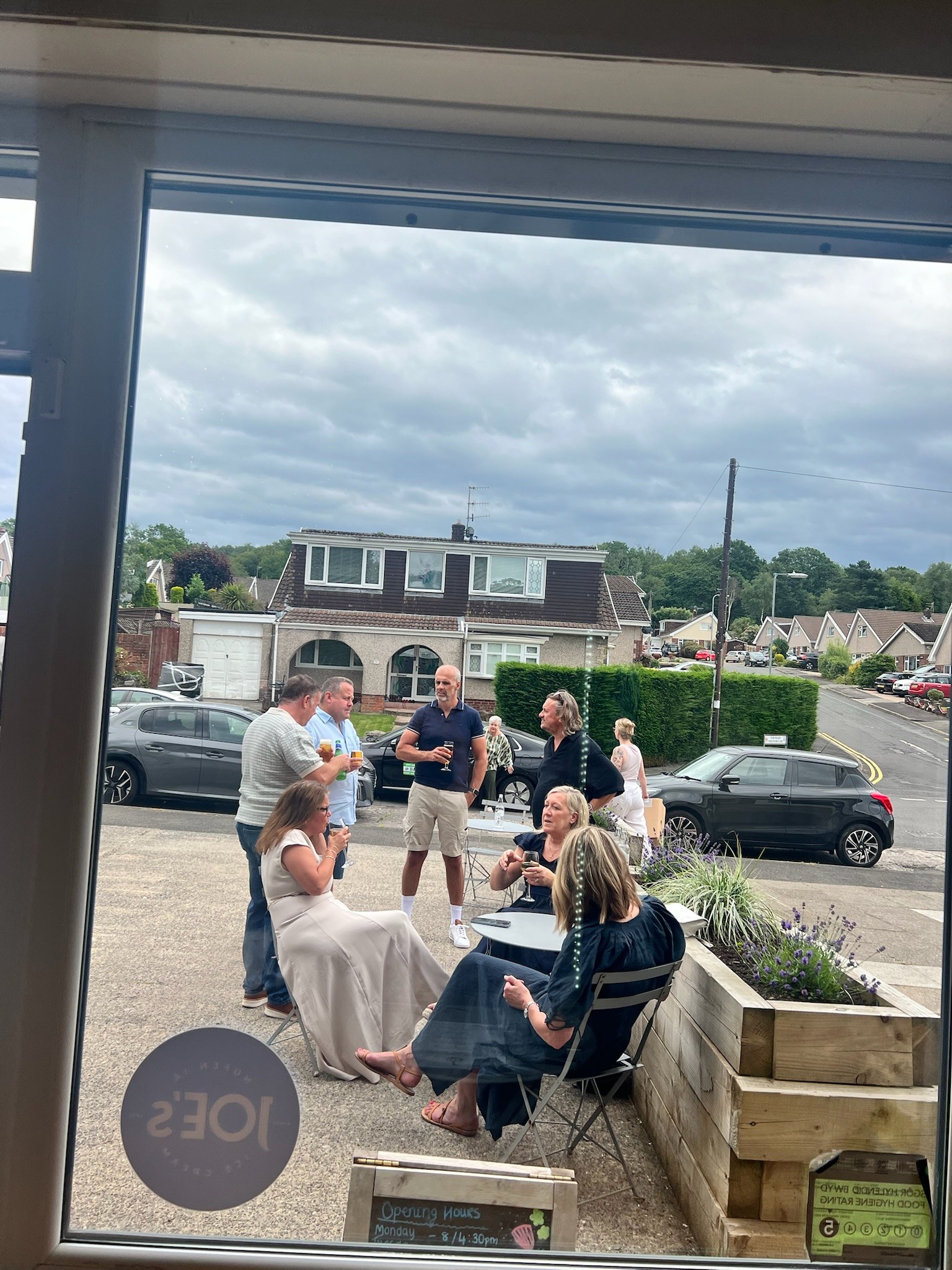 Supper Club guests enjoying drinks and conversation on the Red Hill patio